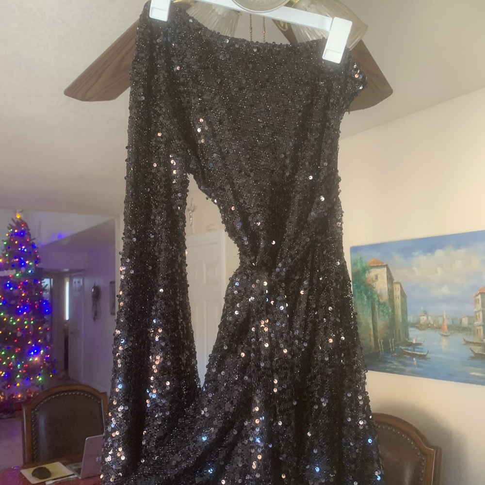 Black off the shoulder sequence wrap dress!